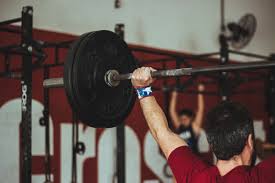 can lifting heavy weight above shoulders cause etd